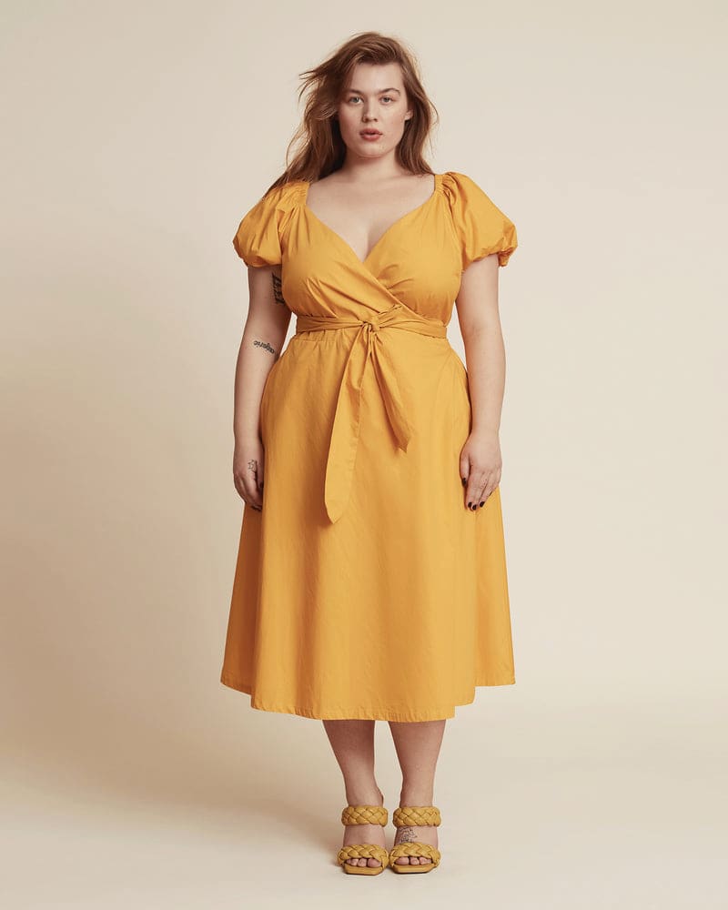 Plus size model wearing Yasmin Wrap Dress by 11 Honoré Collection | Dia&Co | dia_product_style_image_id:199908